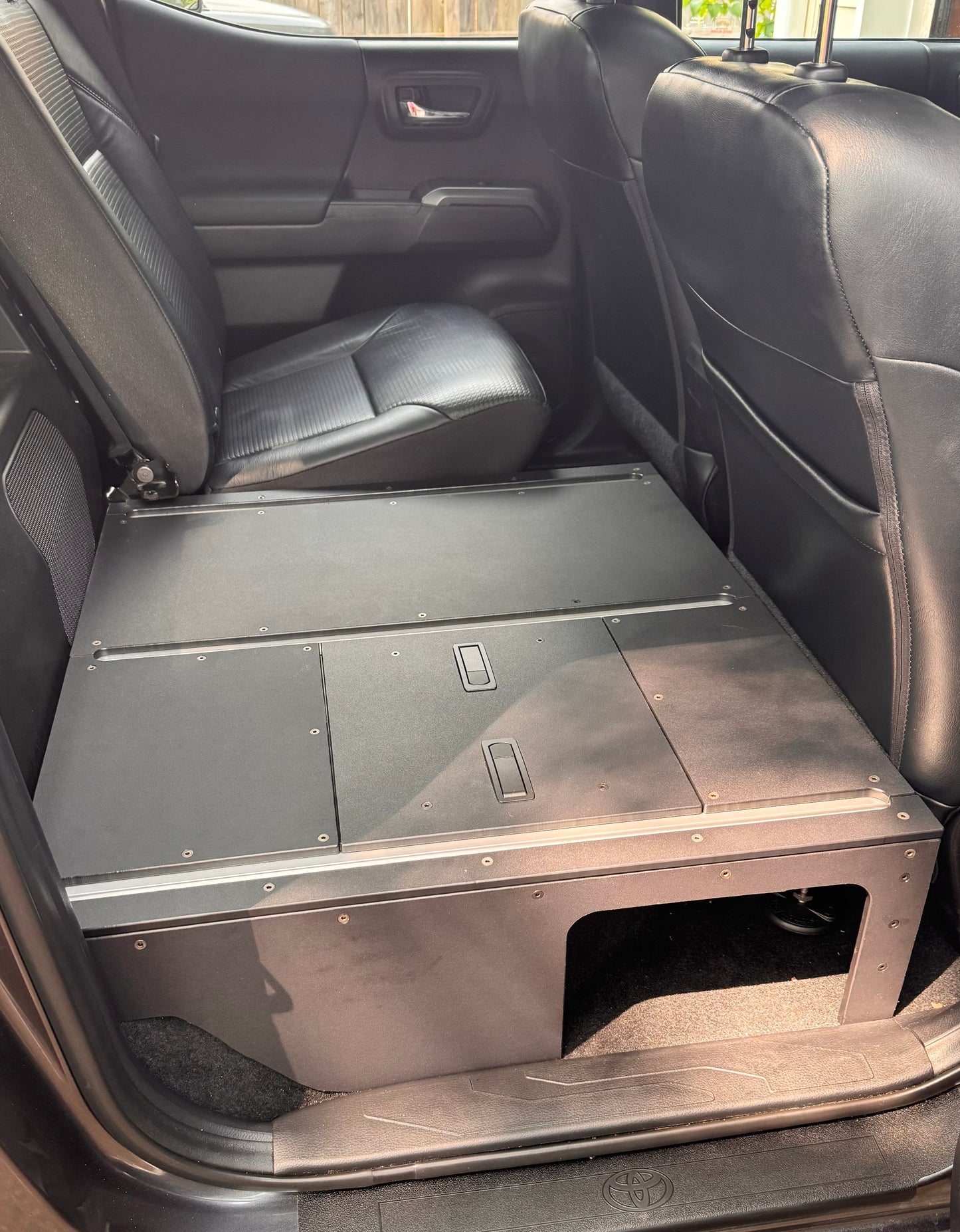 Toyota Tacoma 60% Rear Seat Delete Kit, converting the rear 60% seats into a cargo storage platform.